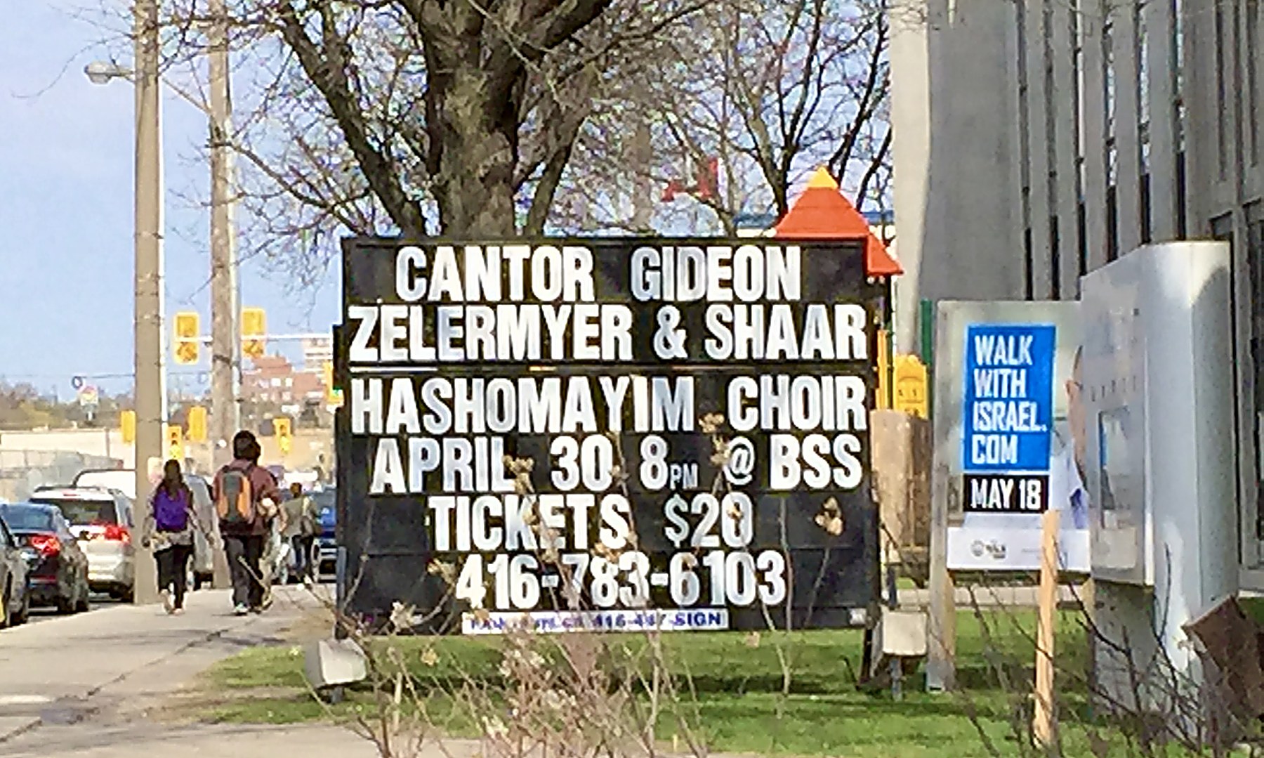 A changeable-letter marquee on a Toronto street reading: Cantor Gideon Zelermyer & Shaar Hashomayim Choir, April 30, 8pm at BSS &mdash; Beth Sholom Synagogue &mdash; tickets $20.