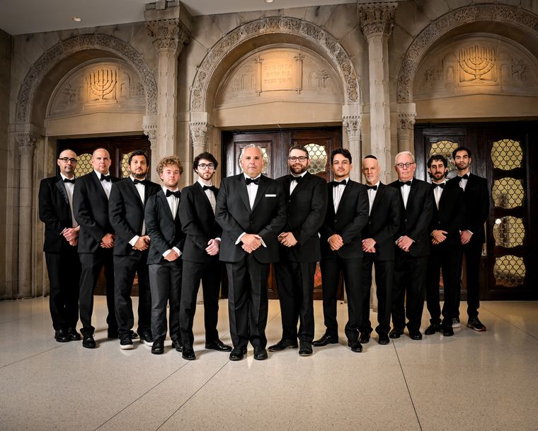 Gideon Zelermyer and the twelve men of the Shaar Hashomayim Synagogue Choir in black tie.