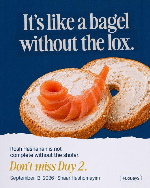 A sesame bagel spread with cream cheese, the smoked salmon curled and rolled into the shape of a shofar.