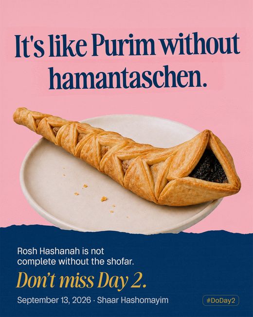 A hamantasch on a plate, stretched and curled into the shape of a shofar with poppy seed filling at the wide end.