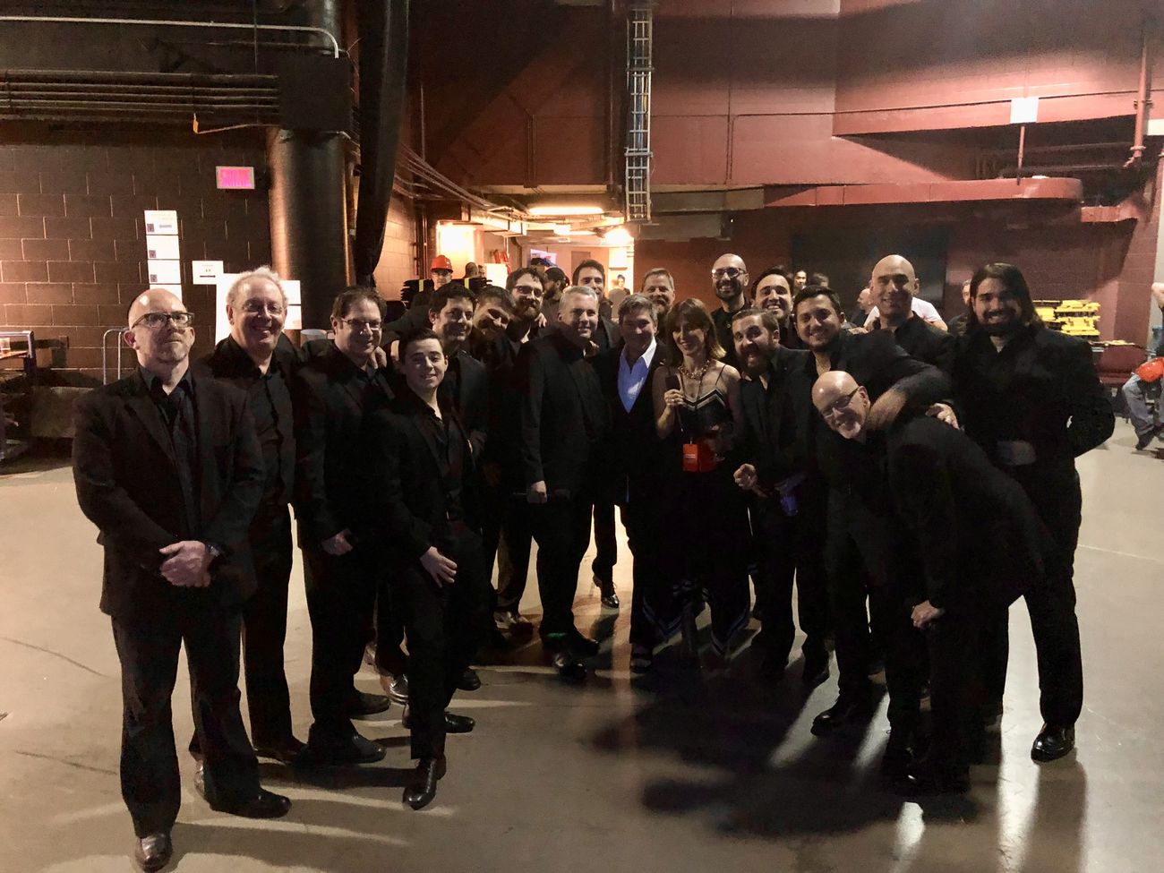 Zelermyer and the Shaar Hashomayim choir photographed with k.d. lang and Feist in a concrete service corridor beneath the Bell Centre.